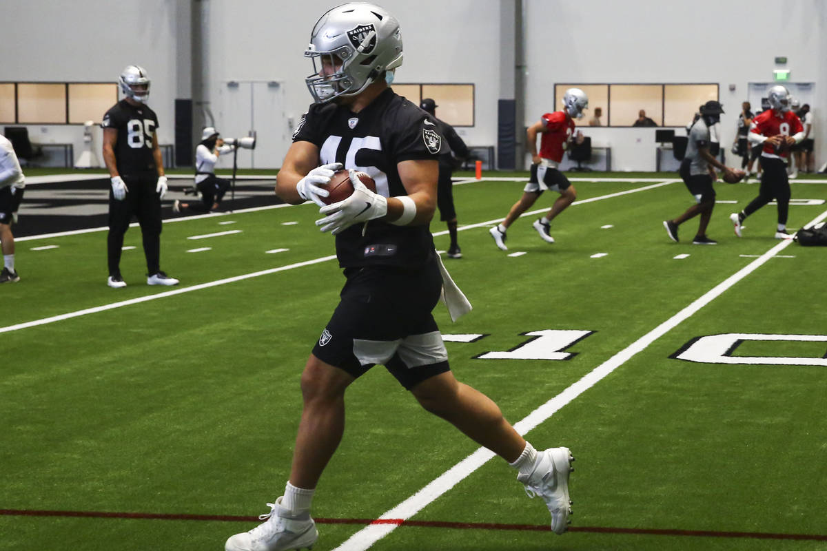 Las Vegas Raiders fullback Alec Ingold (45) catches a ball during an NFL training camp practice ...