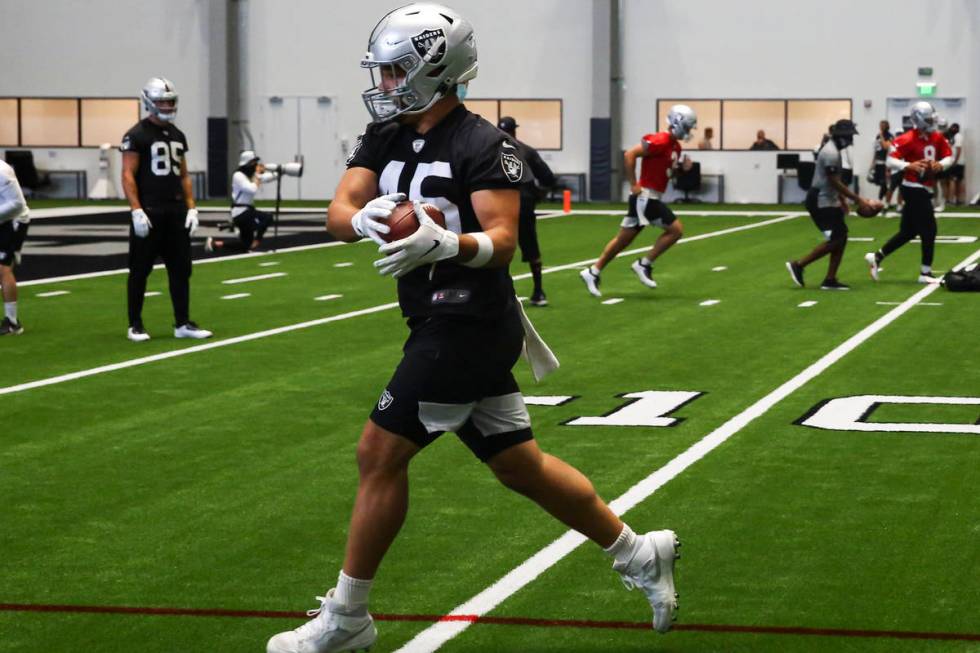 Las Vegas Raiders fullback Alec Ingold (45) catches a ball during an NFL training camp practice ...