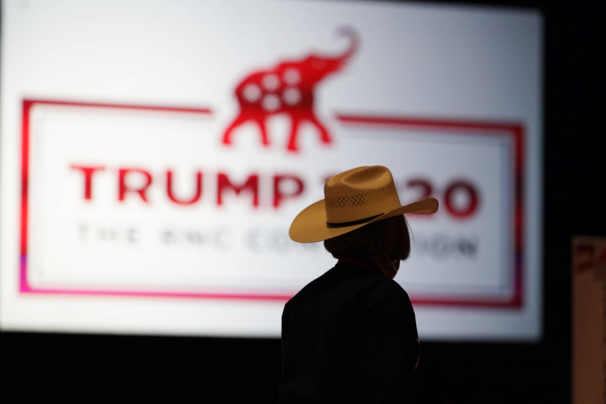 The room is set and delegates begin to arrive for the first day of the Republican National Conv ...