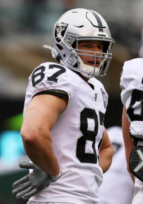 Oakland Raiders tight end Foster Moreau (87) on the field prior to an NFL game against the New ...