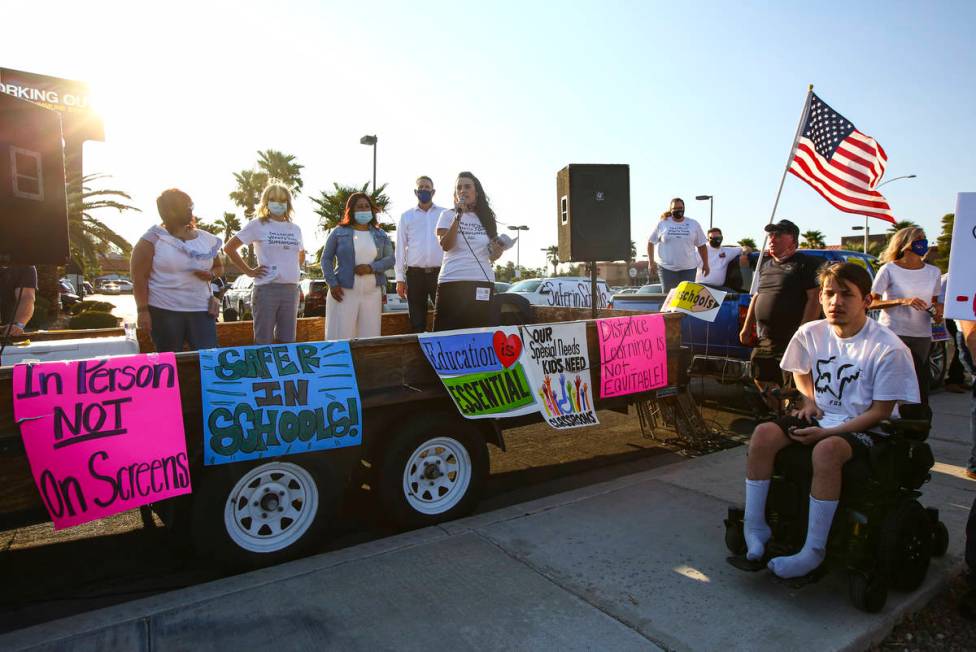 Charlie Melvin, director of public relations for Power2Parent, speaks a demonstration in suppor ...