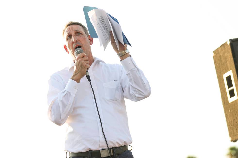 State Sen. Scott Hammond, R-Las Vegas, speaks during a demonstration in support of reopening pu ...