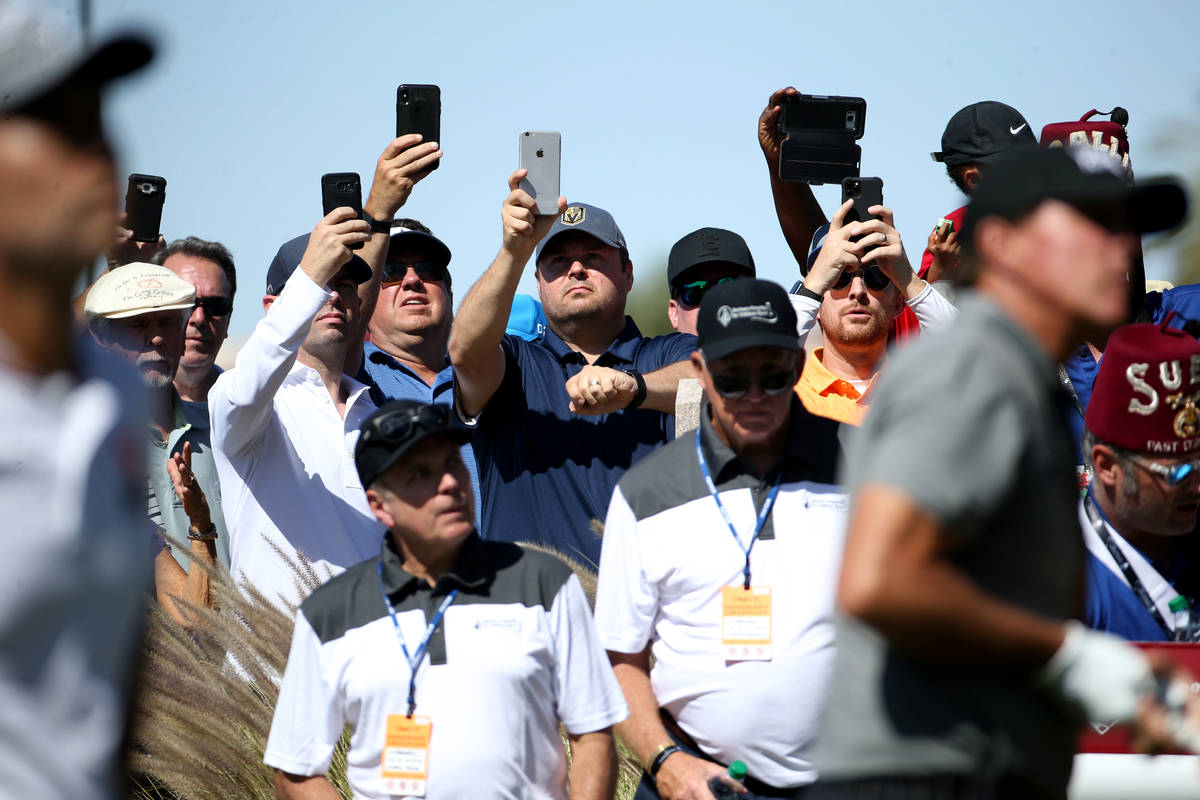 Fans take phone photos Kevin Na and Phil Mickelson on the fifth hole during second round of Shr ...