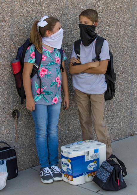 Ute Perkins Elementary School students Morgan, left, and Connor Wolfley, both 10, stand in the ...