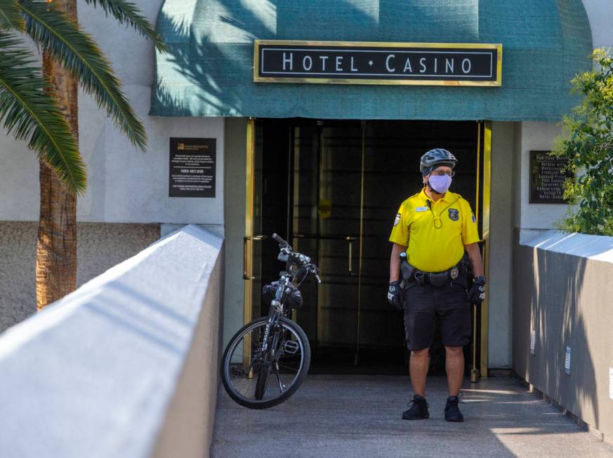 A security guard works the hotel and casino entrance leading from the garage as the Mirage reop ...