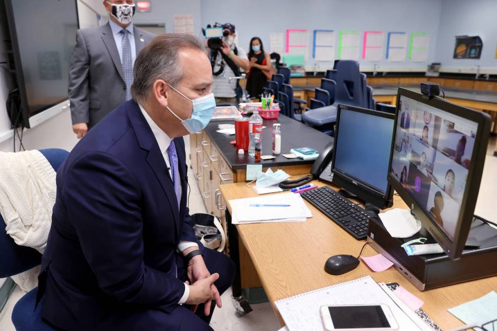 Clark County School District Superintendent Jesus Jara, center, greets distance learning studen ...