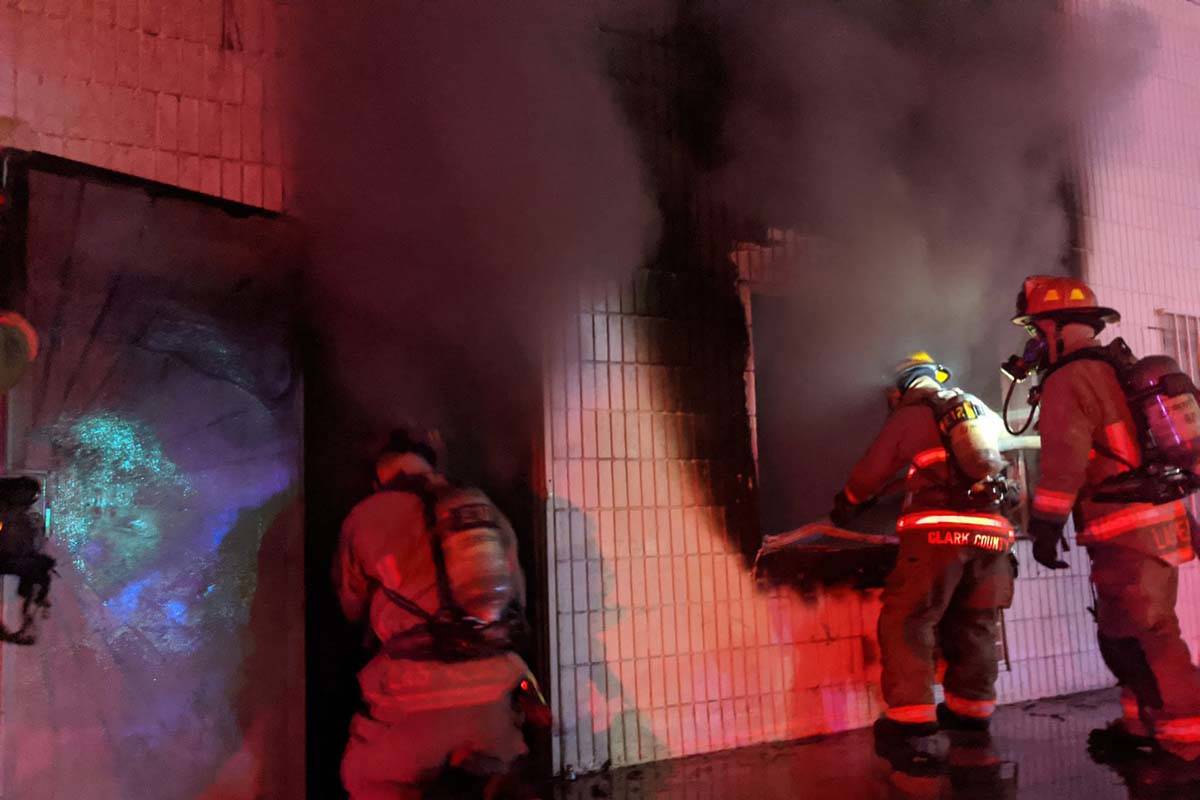 Las Vegas firefighters battle a fire in an industrial building at 2458 Industrial Road early We ...