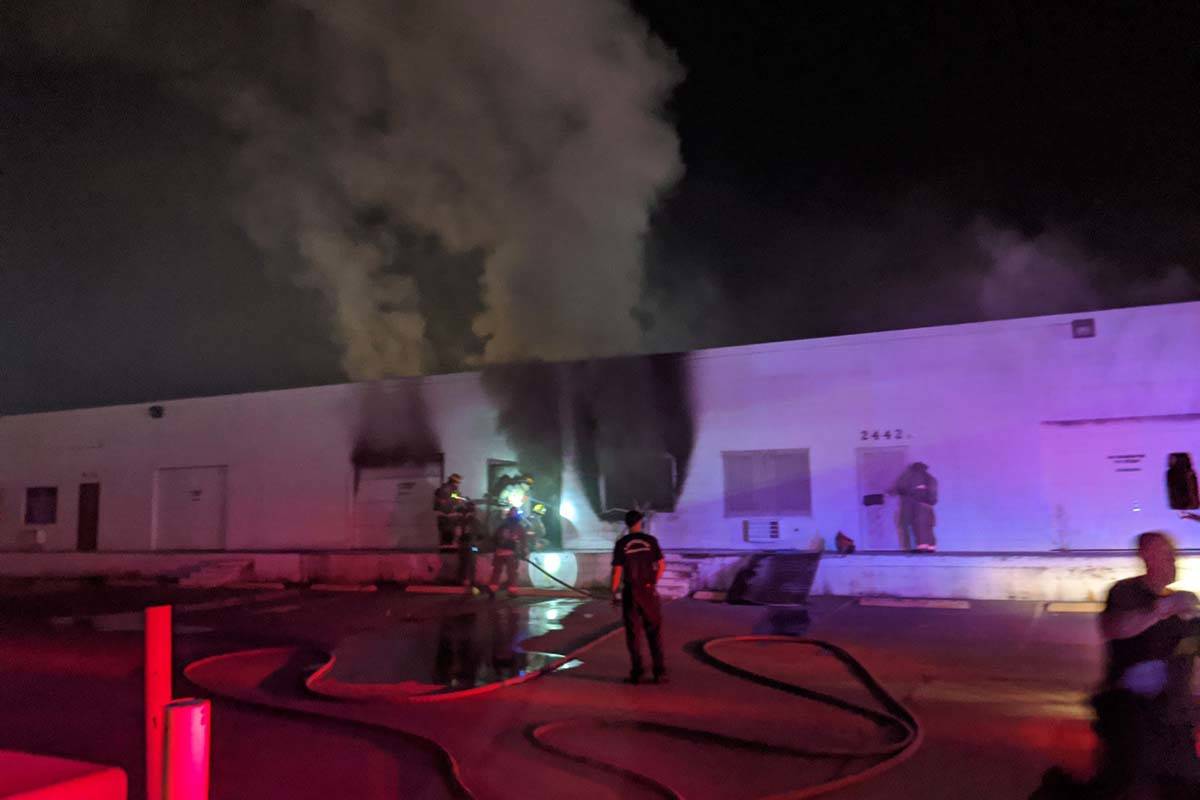 Las Vegas firefighters battle a fire in an industrial building at 2458 Industrial Road early We ...