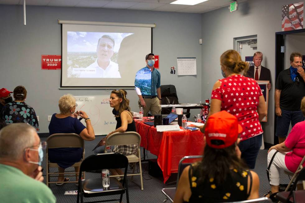 Trump supporters mingle before a Republican National Convention watch party on Wednesday, Aug. ...