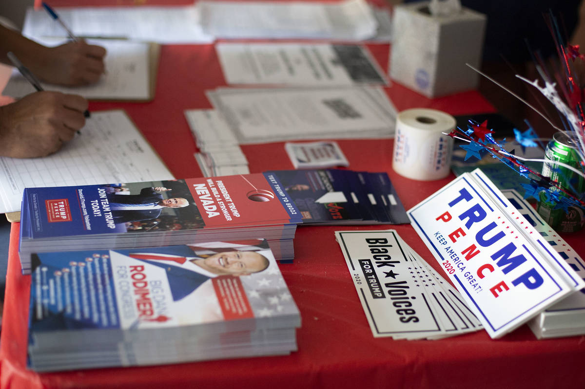 People give their contact information before a Republican National Convention watch party on We ...