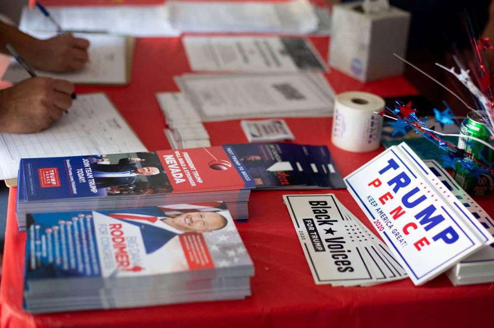 People give their contact information before a Republican National Convention watch party on We ...