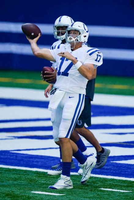 Indianapolis Colts quarterback Philip Rivers (17) throws during practice at the NFL team's foot ...