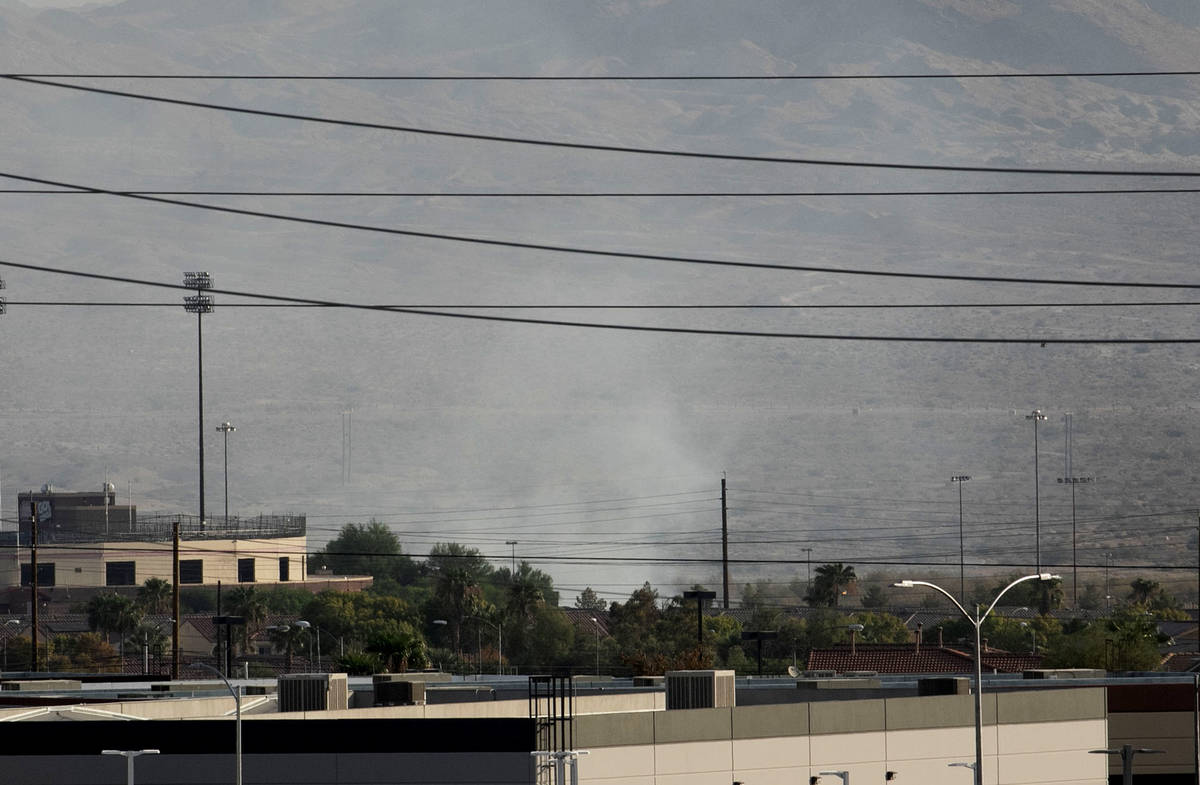 Smoke is seen as the Clark County Fire Department is fighting a fire at the Clark County Wetlan ...