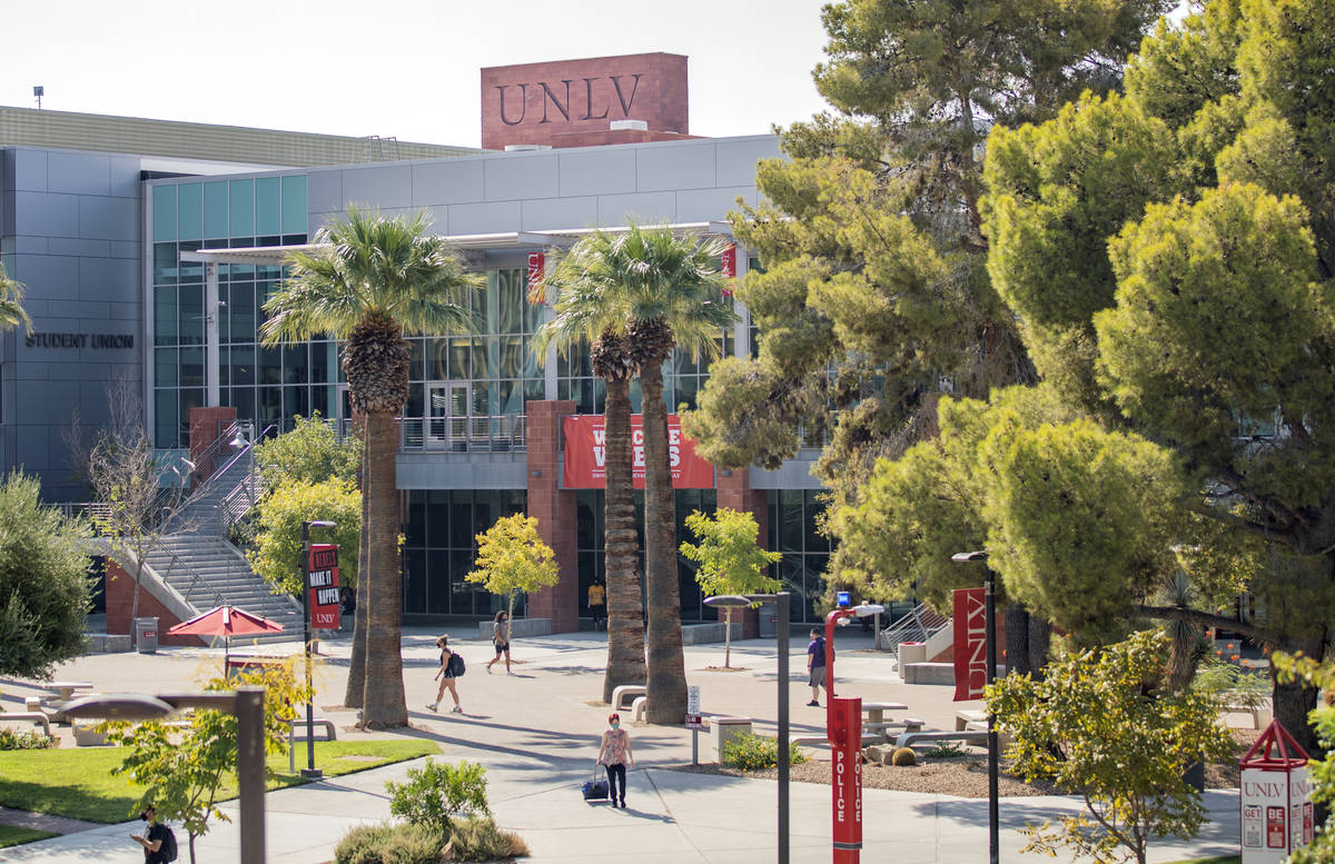 Students and faculty are seen outside of the Student Union at UNLV, in Las Vegas on Thursday mo ...