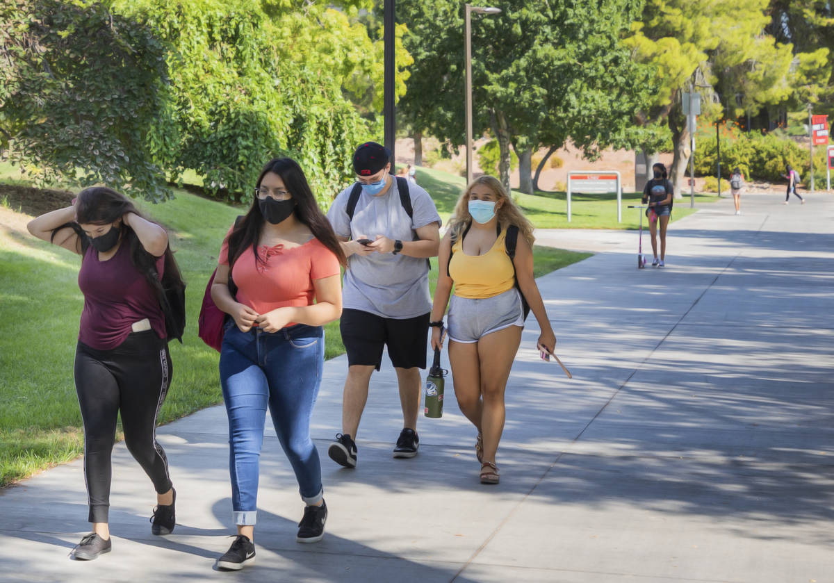 Students are seen walking toward the Student Union at UNLV, in Las Vegas on Thursday morning, A ...