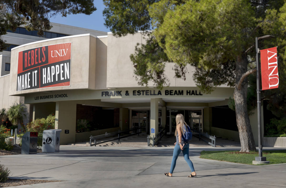 A student walk by Frank and Estella Beam Hall at UNLV, in Las Vegas on Thursday morning, Aug. 2 ...