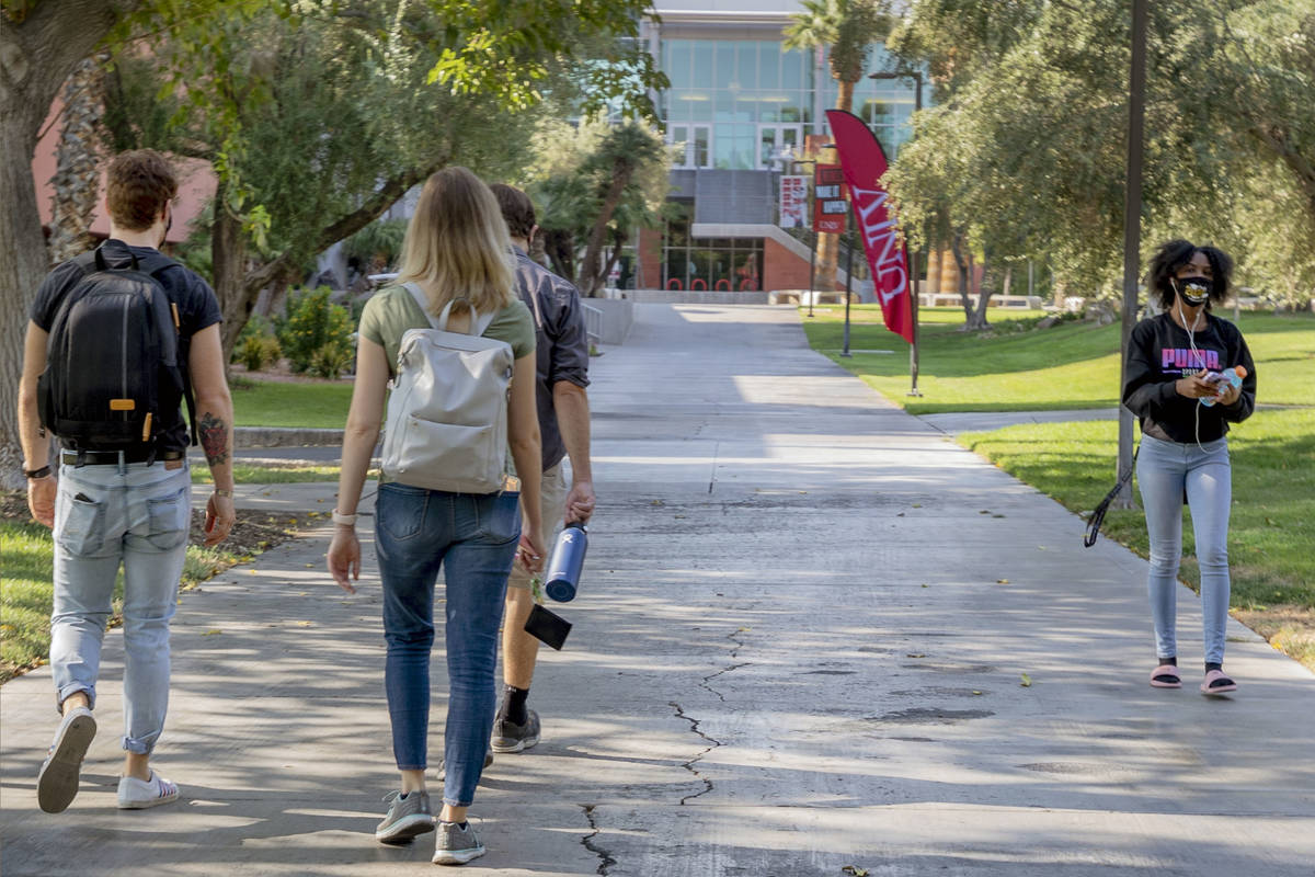 Students are seen outside near the Student Union at UNLV, in Las Vegas on Thursday morning, Aug ...