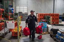 Jason Ritz from Clark County Fire Department unloads gear packed for the Hurricane Florence mis ...