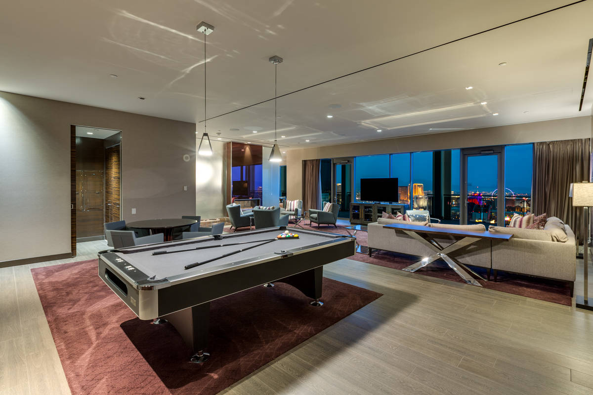 The 3,300-square-foot Palms Place penthouse features an open floor plan with an entertainment a ...