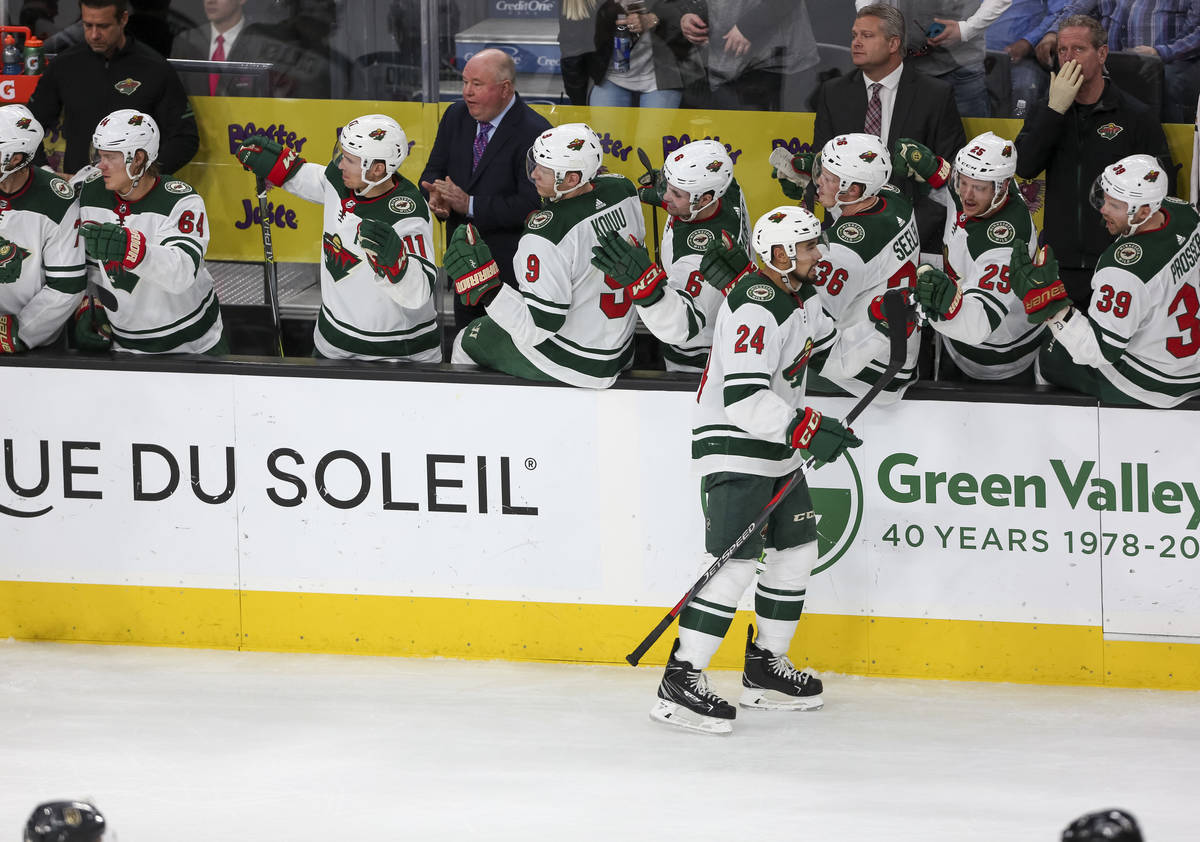 Minnesota Wild defenseman Matt Dumba (24) celebrates with teammates after scoring against the V ...