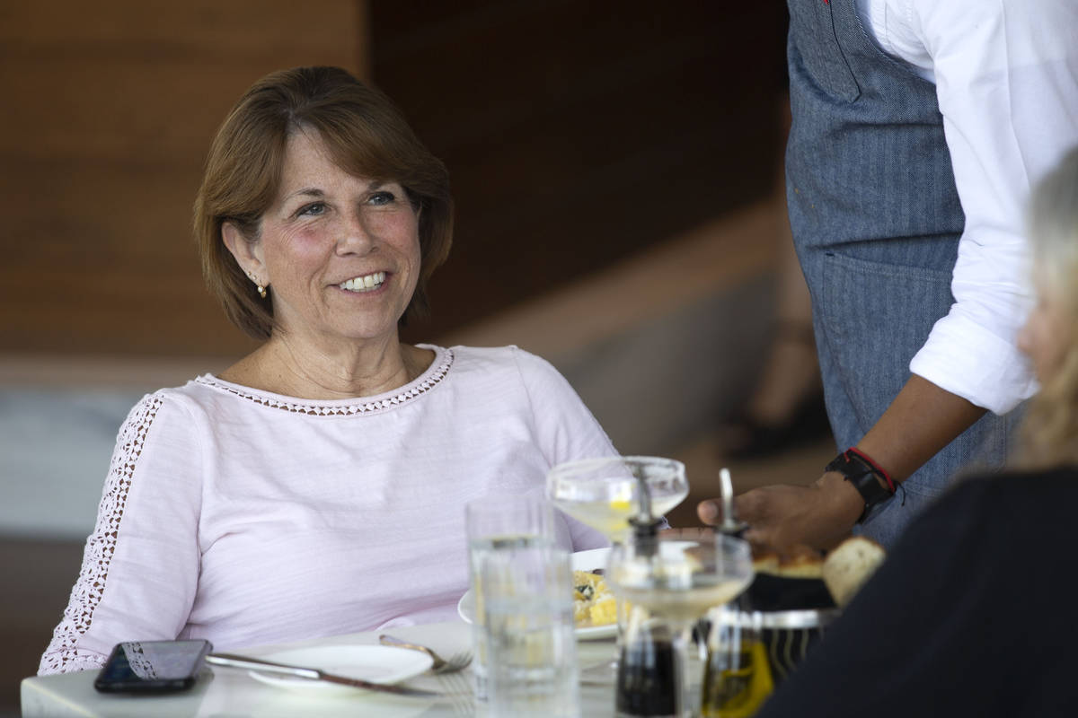 Patricia Cuervo of Las Vegas has dinner with friends on the patio at Osteria Fiorella in Red Ro ...