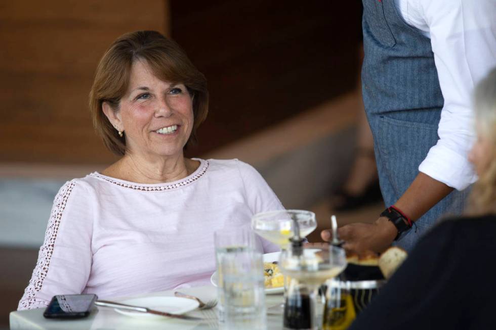 Patricia Cuervo of Las Vegas has dinner with friends on the patio at Osteria Fiorella in Red Ro ...