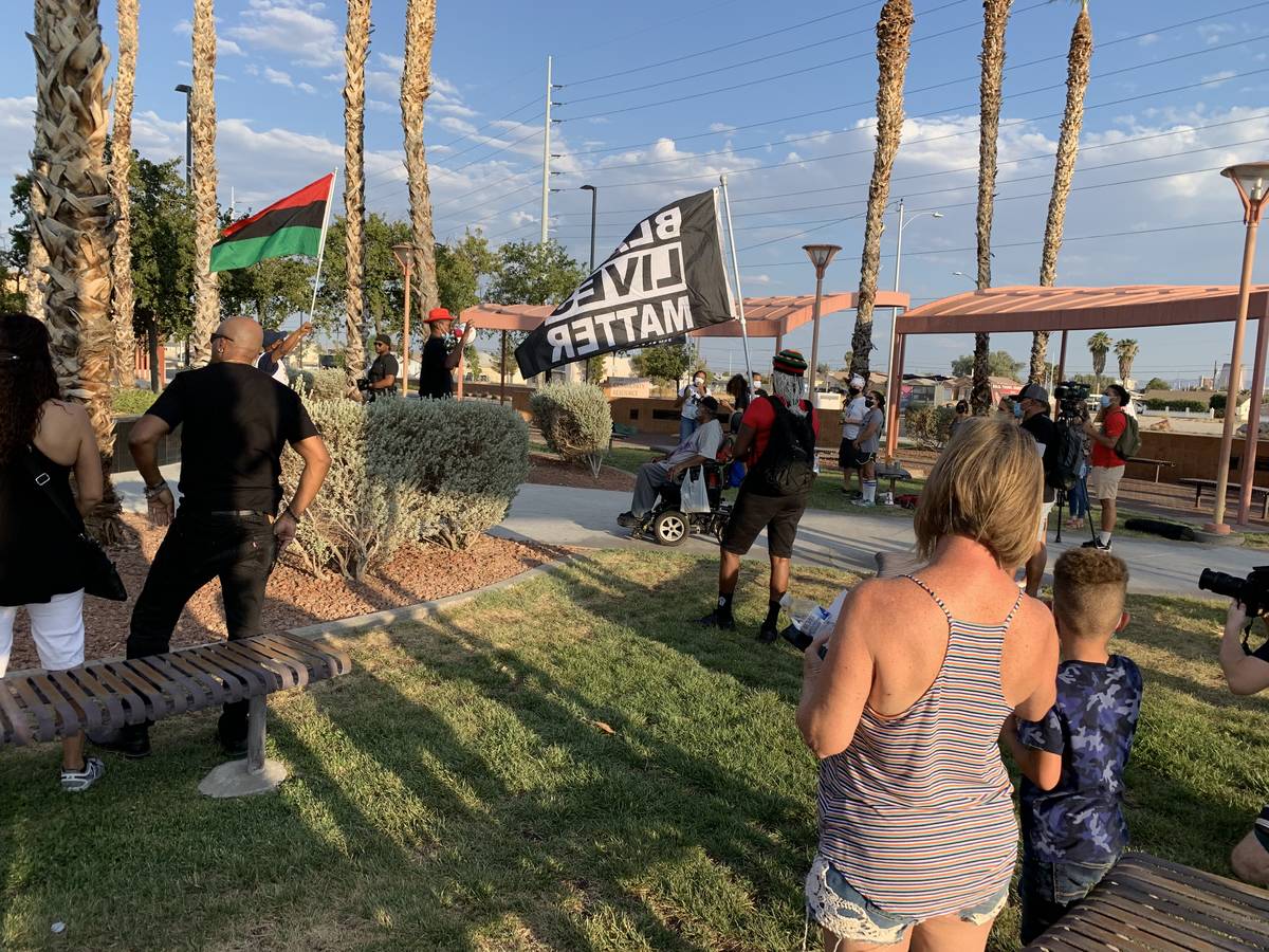 A rally and vigil in honor of victims of police brutality was being held in North Las Vegas on ...