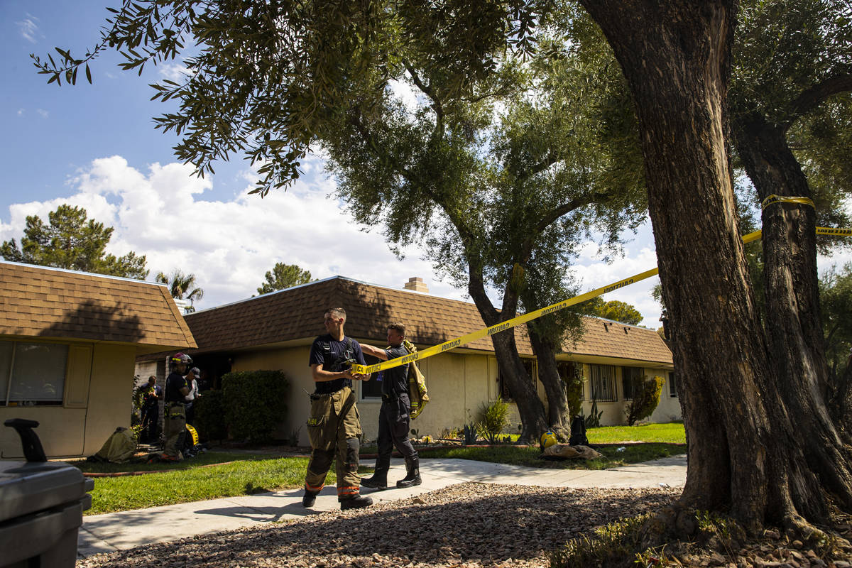 Clark County firefighters respond to the scene of a residential fire that left one dead near Sa ...