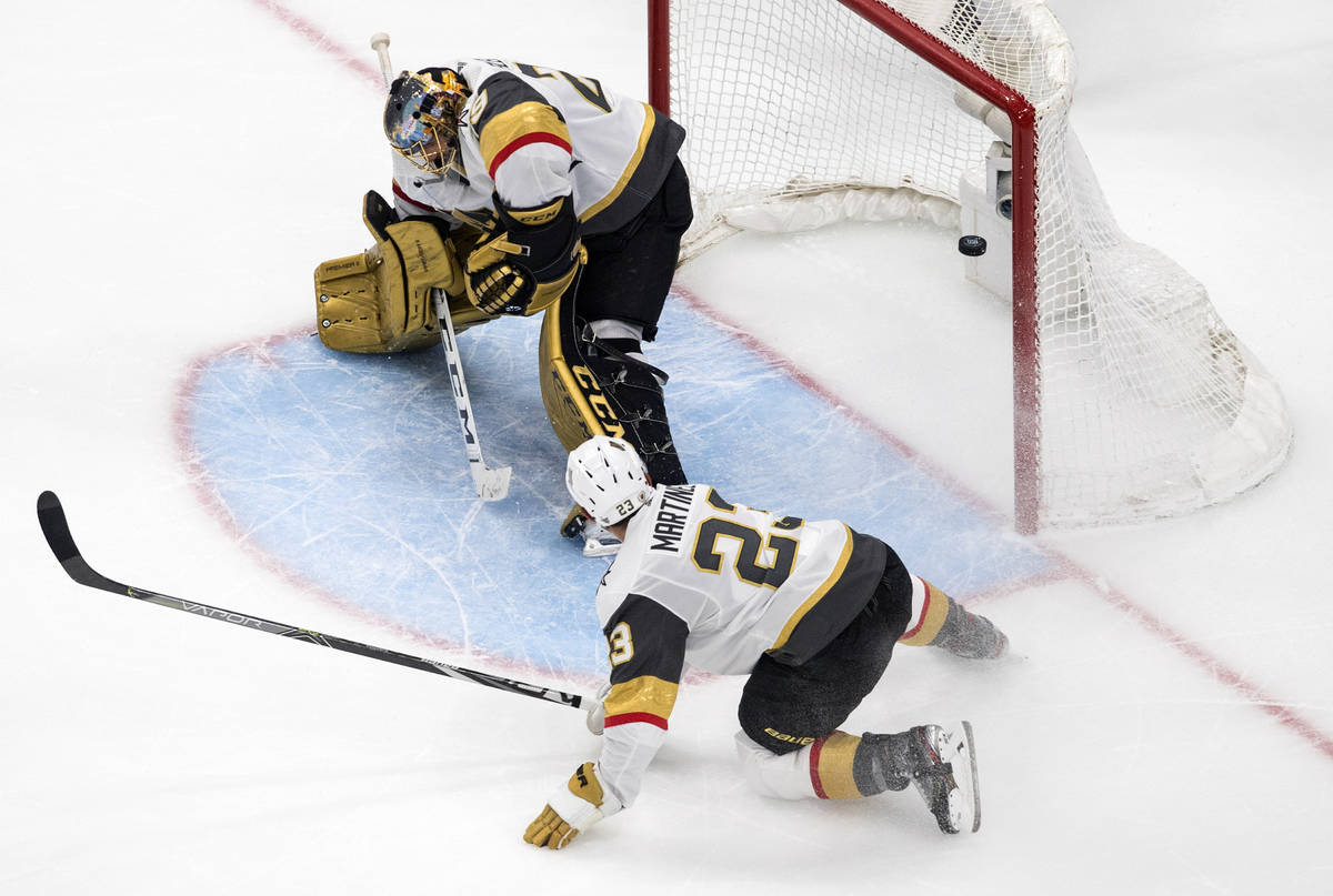 Vegas Golden Knights goalie Marc-Andre Fleury (29) is scored on by Vancouver Canucks' Tyler Tof ...