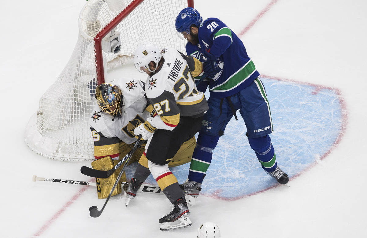 Vegas Golden Knights goalie Marc-Andre Fleury (29) makes a save on Vancouver Canucks' Brandon S ...