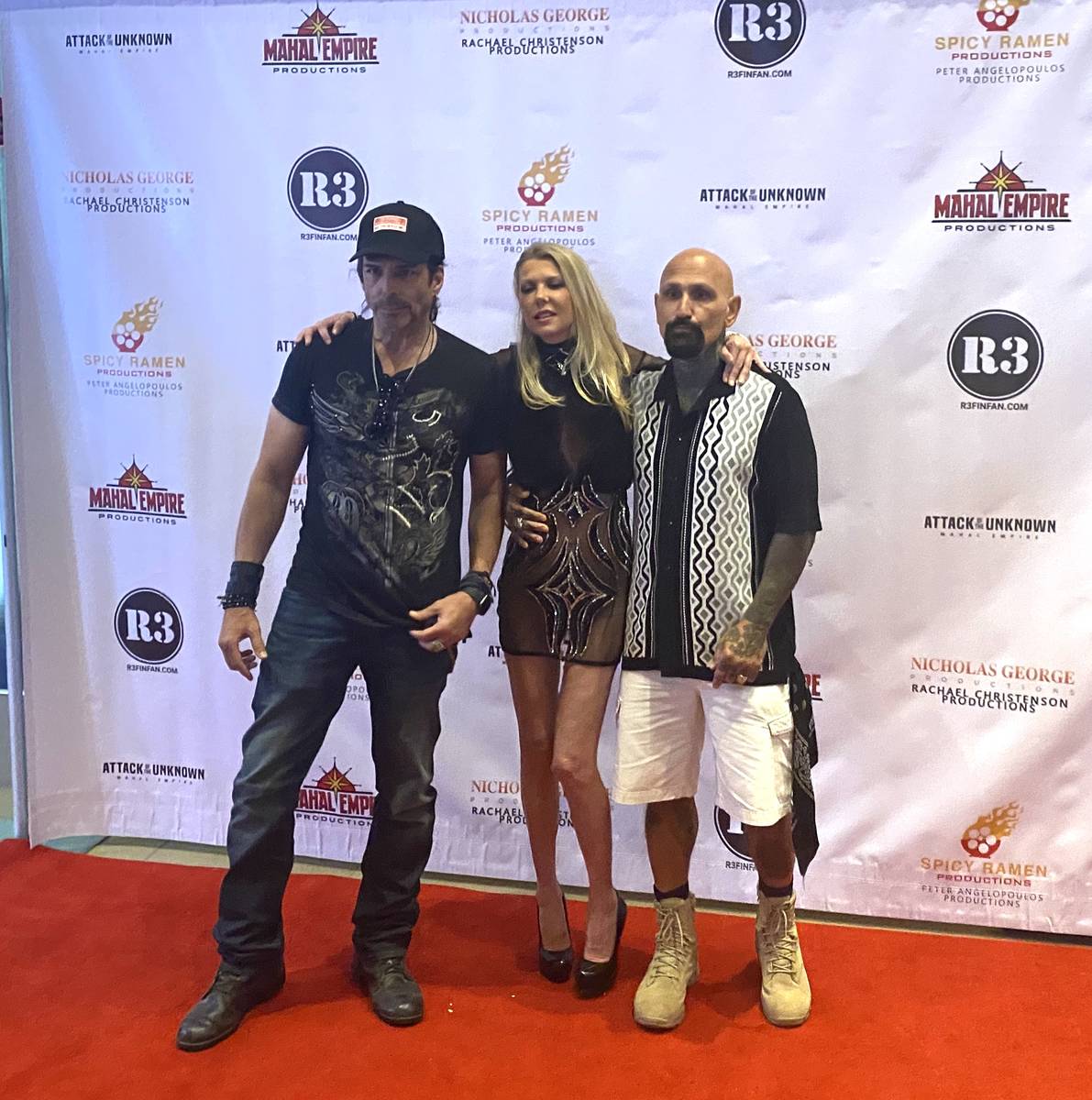Richard Grieco, Tara Reid and Rober LaSardo are shown on the red carpet of the premiere of "Att ...