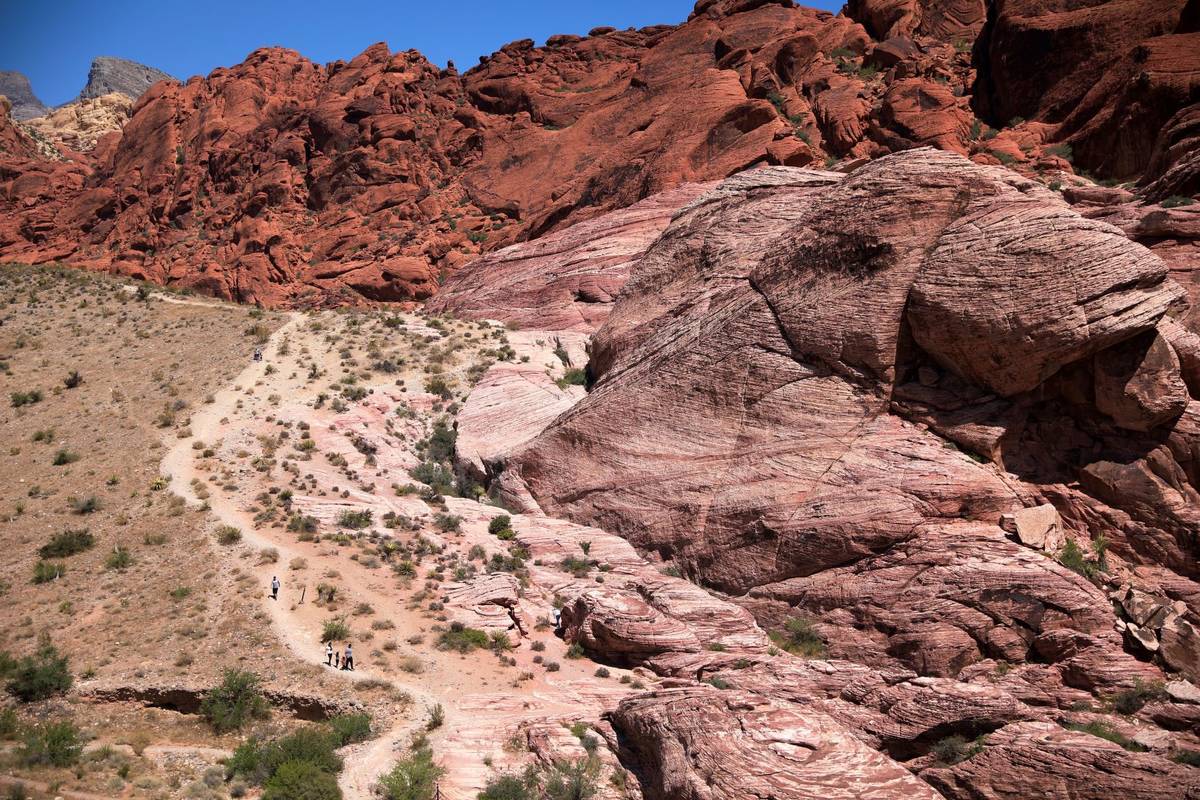 Hikers enjoy the outdoors at Red Rock National Conservation Area in Las Vegas, Sunday, Aug. 30, ...