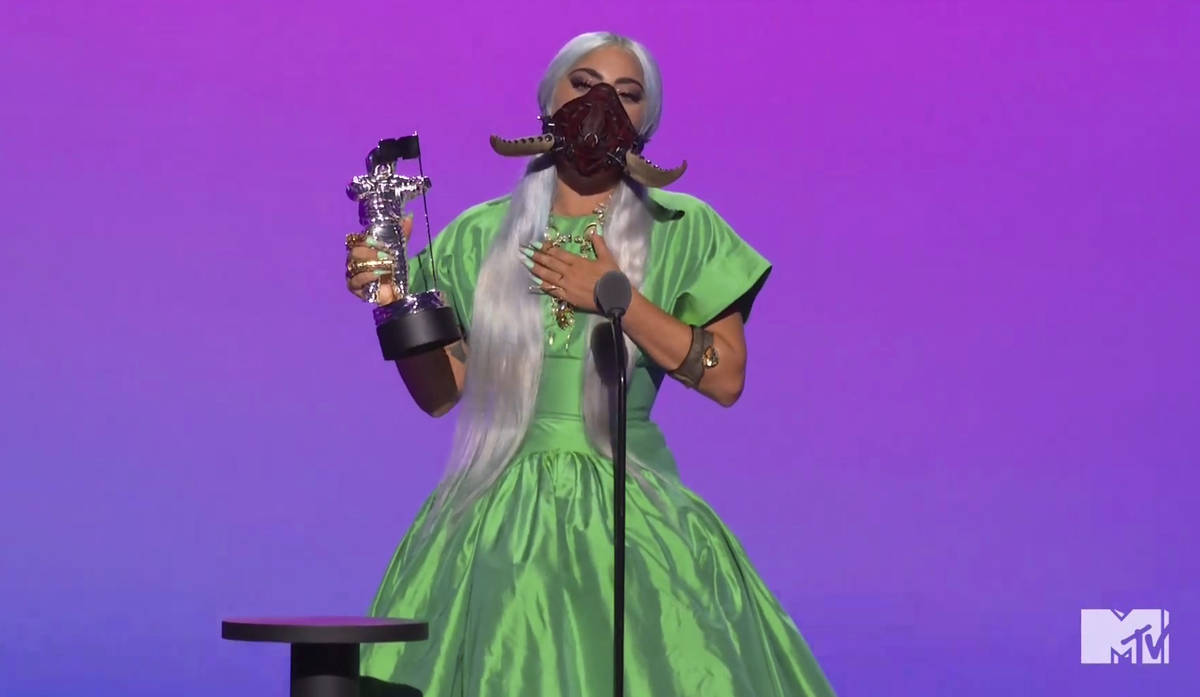 In this video grab issued Sunday, Aug. 30, 2020, by MTV, Lady Gaga accepts the award for song o ...