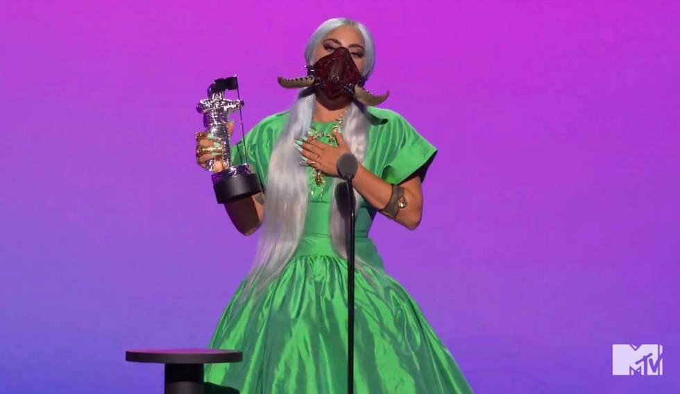 In this video grab issued Sunday, Aug. 30, 2020, by MTV, Lady Gaga accepts the award for song o ...