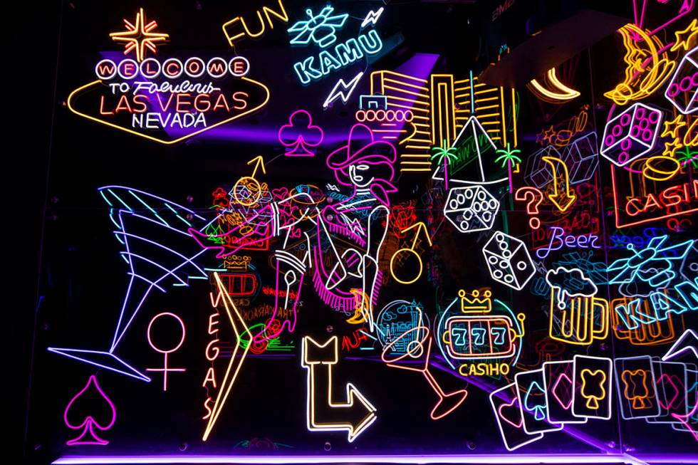 A room filled with neon signs at Kamu Karaoke at the Grand Canal Shoppes at The Venetian in Las ...