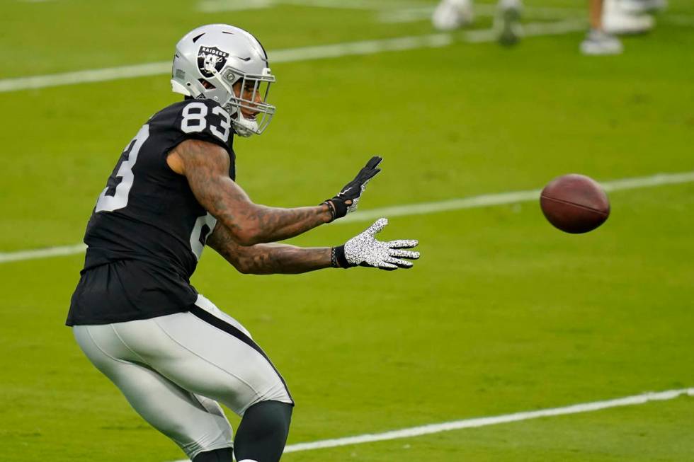 Las Vegas Raiders tight end Darren Waller (83) catches a ball during an NFL football training c ...