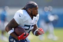 Tennessee Titans running back Derrick Henry runs a drill during NFL football training camp Tues ...
