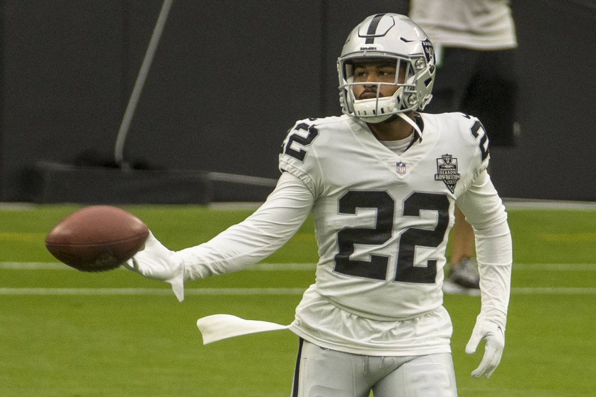 Las Vegas Raiders cornerback Keisean Nixon (22) reach out for the ball during warm ups for a sc ...