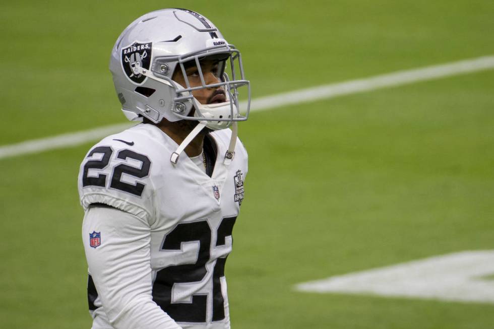 Las Vegas Raiders cornerback Keisean Nixon (22) walks up the field while warming up during a fo ...