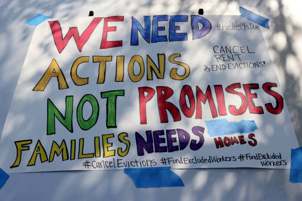 A sign on a car at Make the Road Nevada offices before a caravan in Las Vegas to protest evicti ...