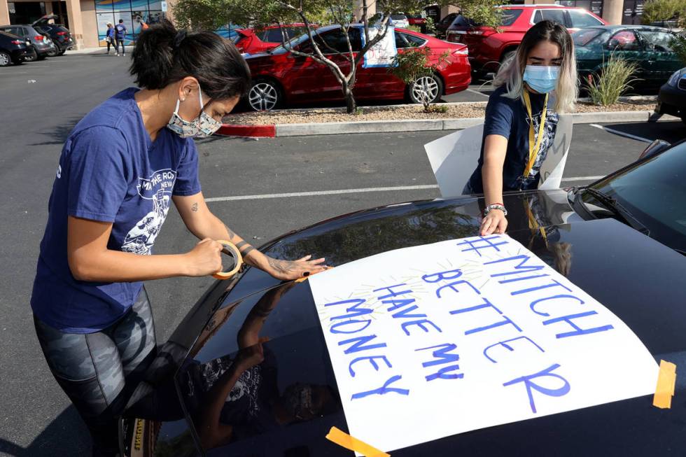 Verania Rebolledo, left, and Jenny Ordaz, both of Las Vegas, prepare at Make the Road Nevada of ...