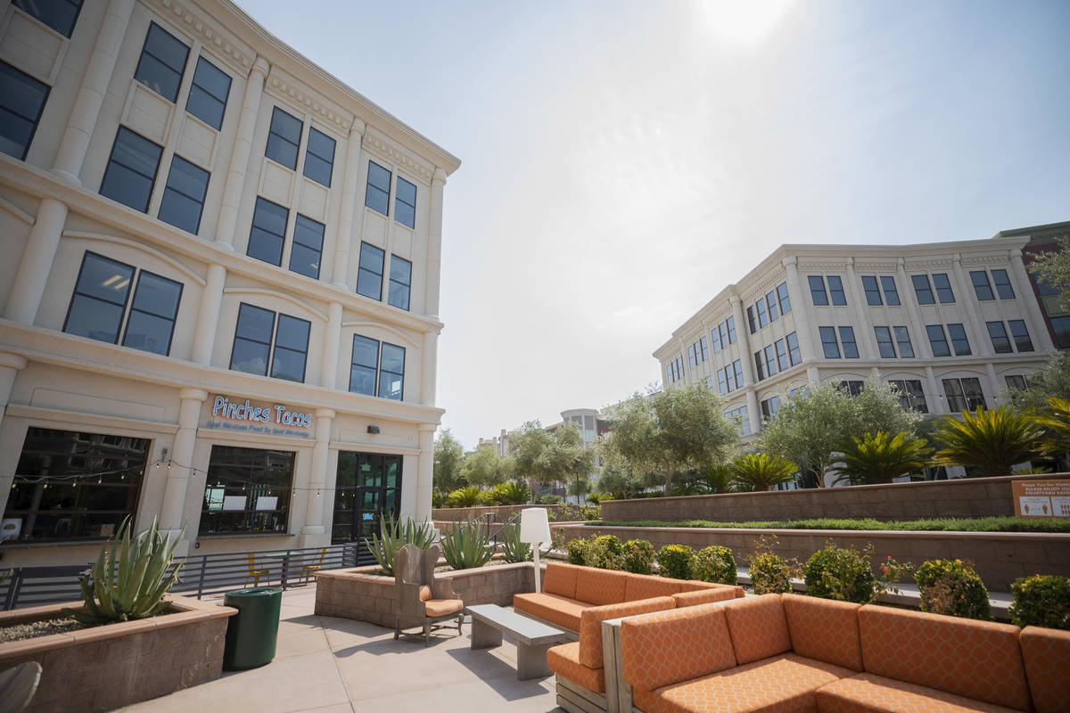 Pinches Tacos is seen underneath apartment units at the Gramercy, a mixed-use complex in the so ...