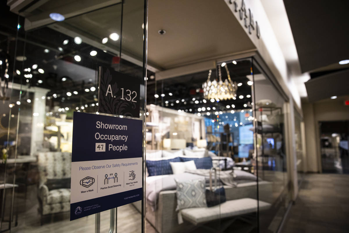 A sign with safety requiremens is seen outside of a showroom at the Summer Las Vegas Market at ...