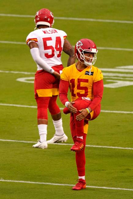 Kansas City Chiefs quarterback Patrick Mahomes (15) warms up during NFL football training camp ...