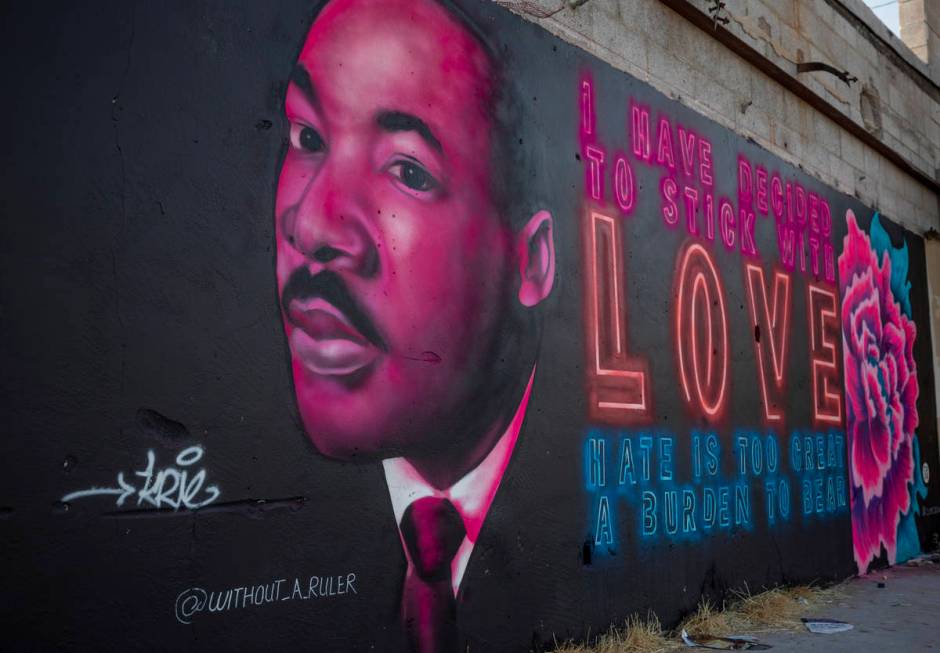 A portrait of Martin Luther King Jr. is seen painted near the Moulin Rouge by artists Krie and ...