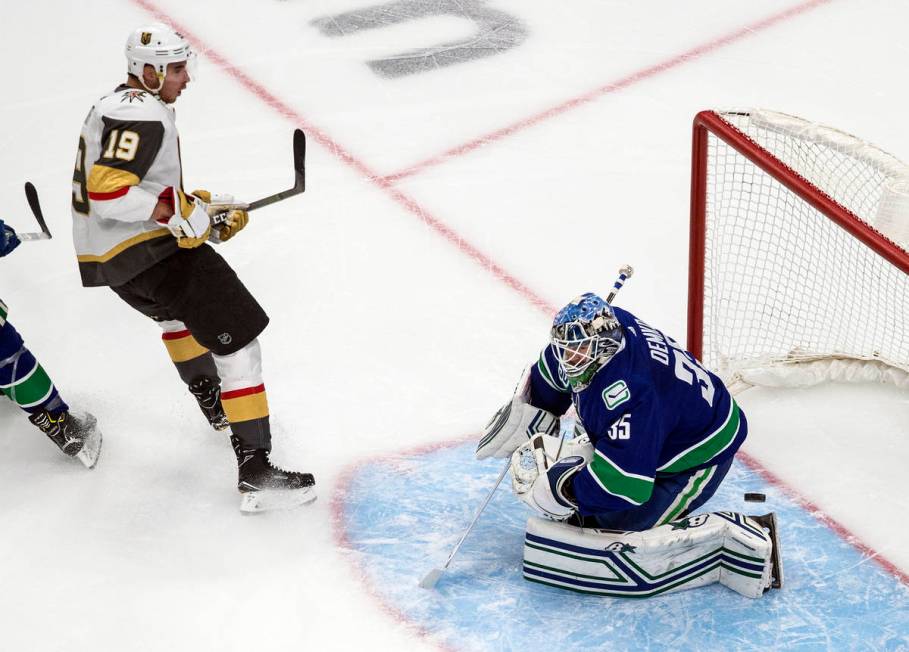 Vancouver Canucks goalie Thatcher Demko (35) makes a save against Vegas Golden Knights' Reilly ...