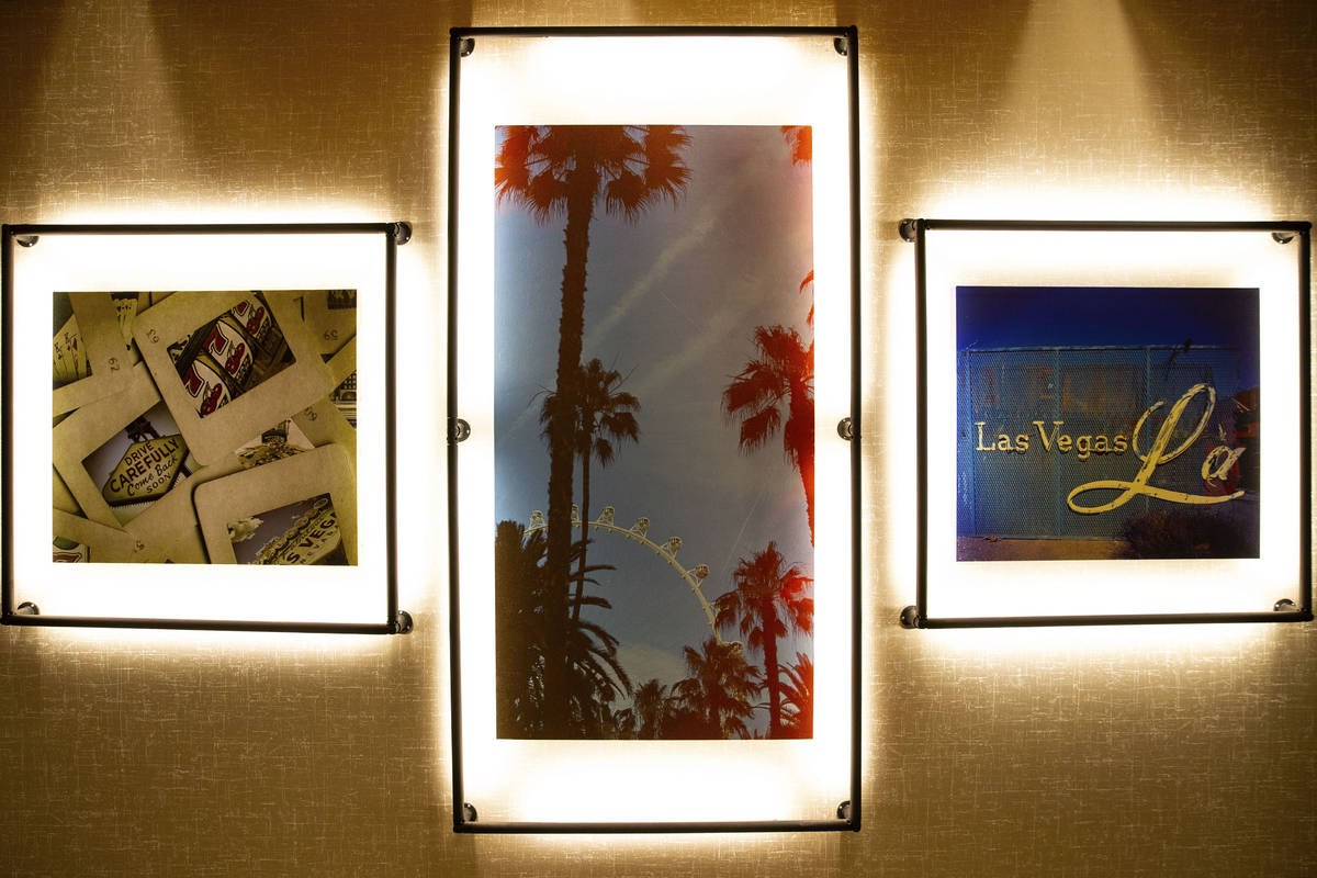 Wall decors are displayed at a newly built, dual branded Hampton Inn & Suites and Home2 Sui ...