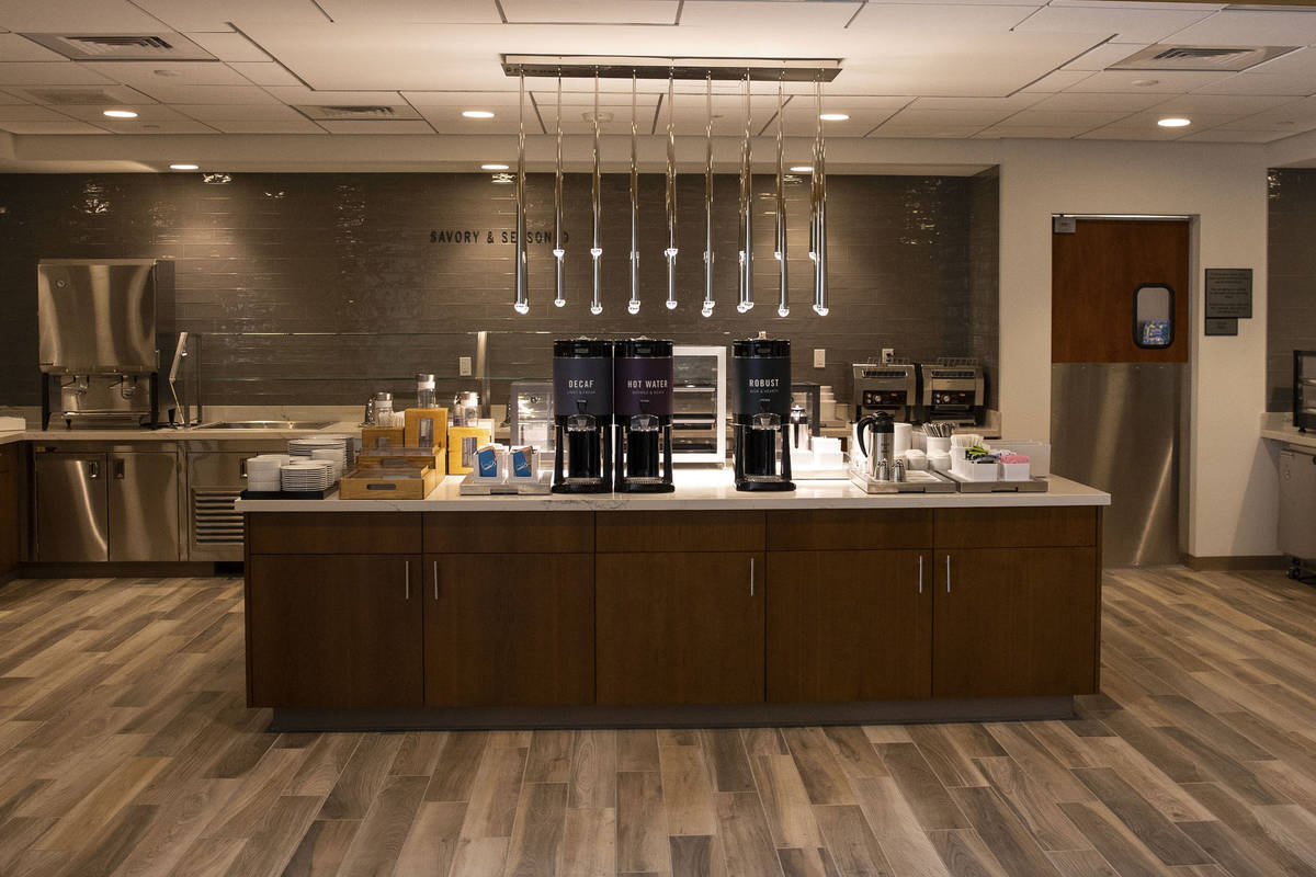 Breakfast area at displayed at a newly built, dual branded Hampton Inn & Suites and Home2 S ...