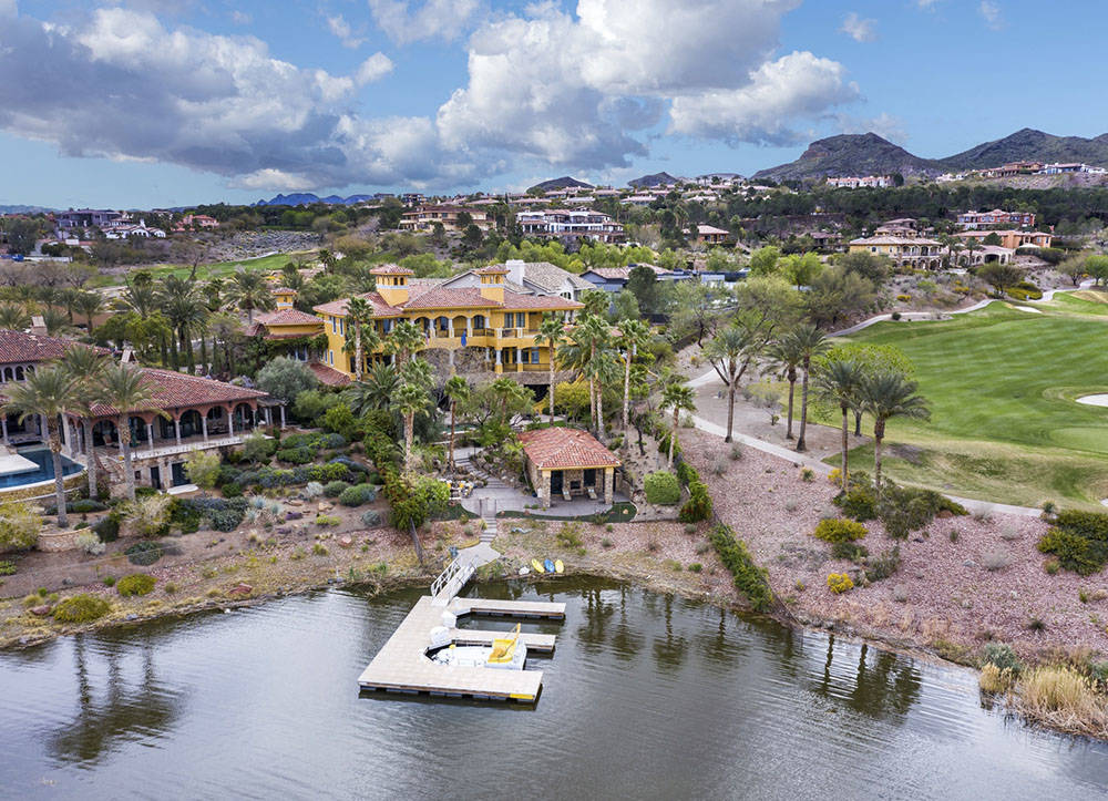 Elite Homes This 10,549-square-foot Mediterranean-style mansion at Lake Las Vegas has been list ...