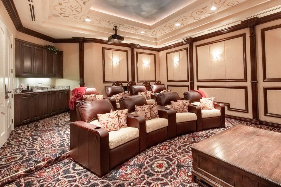 Elite Homes The home has an entertainment level with a home theater and game room.